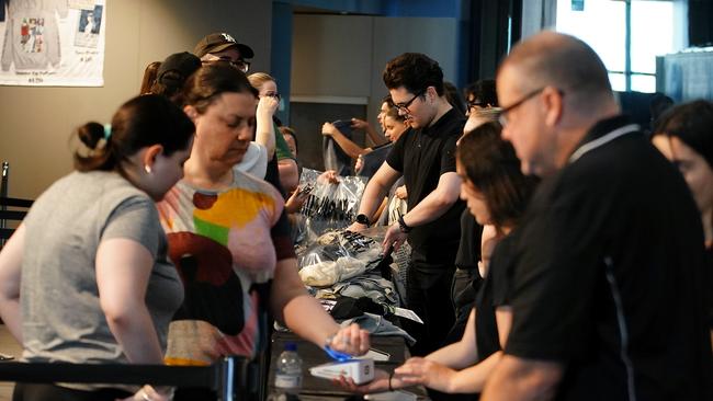 Taylor Swift fans are seen buying merchandise at a pop-up store at Crown Metropol. Picture: NCA NewsWire / Luis Enrique Ascui