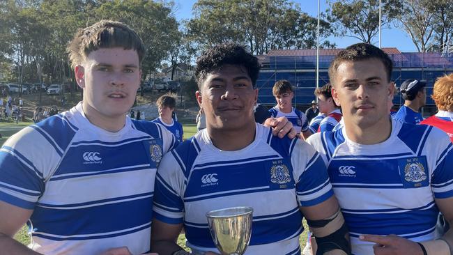 Nudgee skipper Macarius Pereira, middle, Oliver Bar rett with Maddox Maclean.