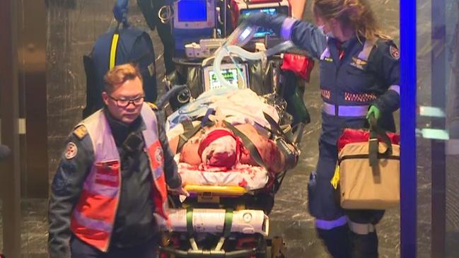 Nazlioglu is wheeled out of his Rhodes apartment block on a stretcher by paramedics last June, before dying in hospital. Picture: TNV,