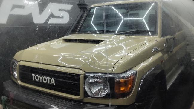 An owner of a limited edition LandCruiser ute has stored his car in a plastic bubble.