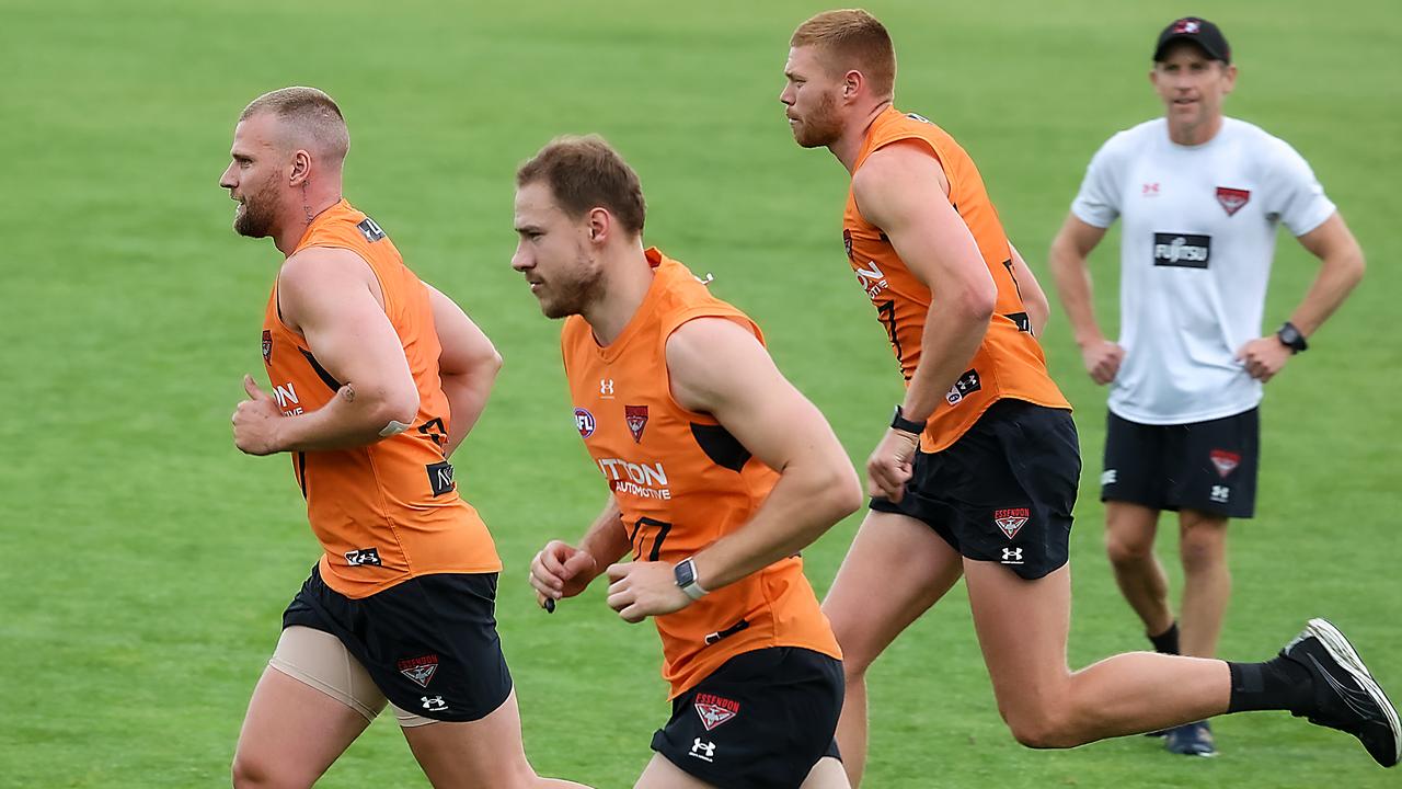 AFL. Essendon FC has an open training session with fans in attendance. Jake Stringer leads new recruit Ben McKay in run throughs. Picture: Ian Currie