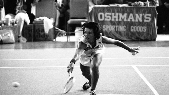 Billie Jean King reaches to hit a return during her match against Bobby Riggs. Pic: AP.