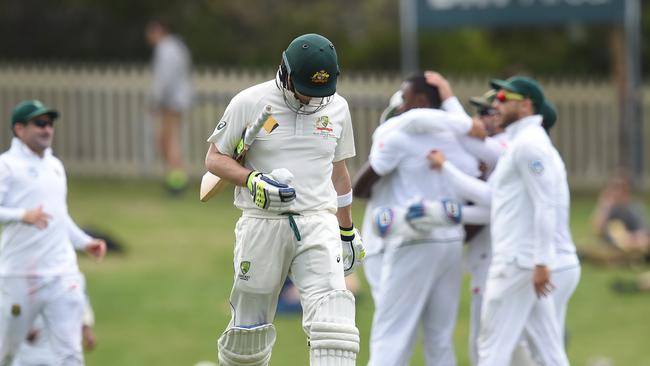 Australian captain Steve Smith departs after being dismissed by South African bowler Kagiso Rabada for 31 runs on day four of the 2nd Test match between Australia and South Africa at Bellerive Oval in Hobart, Tuesday, Nov. 15, 2016. (AAP Image/Dave Hunt)