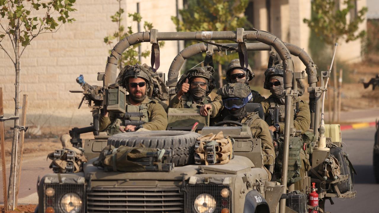 Israeli tanks and troops move near the border with Gaza on October 28. Picture: Dan Kitwood/Getty Images