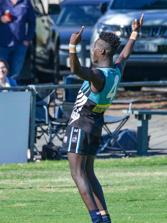 Aron Asfaha celebrates a late goal for Portland in the final quarter to seal the game. Picture: AAP/Brenton Edwards