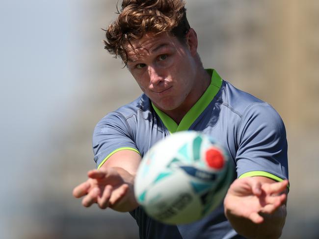 Michael Hooper releases a pass during the final training session for the Aussies.