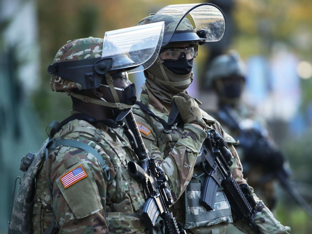 National Guard soldiers patrol the streets of Philadelphia the morning after Americans voted in the presidential election. Picture: Spencer Platt/Getty Images/AFP