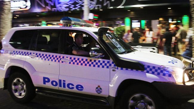 Police officers from Taskforce Takeback team up with officers from the Office of Liquor and Gaming to tackle the problem of binge drinking at the Gold Coast's entertainment precincts. Picture: Brendan Radke.