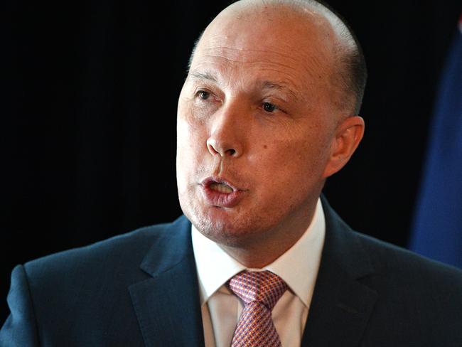 Minister for Home Affairs Peter Dutton speaks at a Refugee Week event at Parliament House in Canberra, Wednesday, June 20, 2018. (AAP Image/Mick Tsikas) NO ARCHIVING