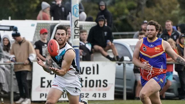 Ryan Wiggins celebrates a goal while playing for Cygnet against Huonville on Saturday April 17th. Photo courtesy of David Clark Photos.