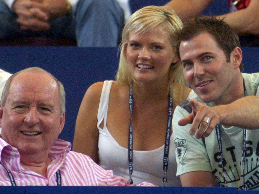 Cricketer Damien Martyn relaxes with his wife Annika and radio personality Alan Jones while watching Russia v Australia in the Hopman Cup tennis tournament in Perth in 2006.