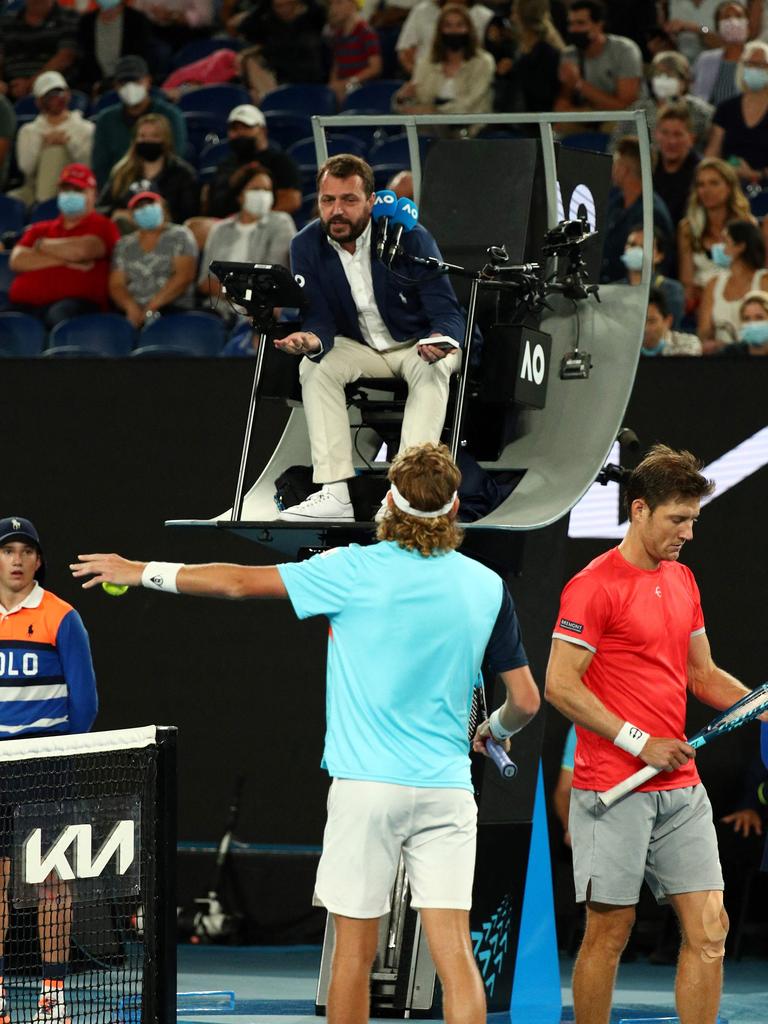 Australia's Max Purcell (C) and Matt Ebden complain to the umpire about fans interjecting in play.