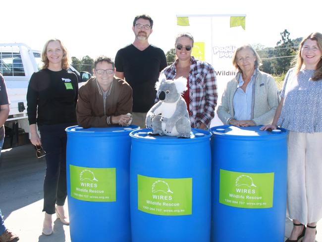 WATER FOR WILDLIFE: Landowners on the Northern Rivers will receive 10 per cent of 800 200L TREE TROFFÂ® arboreal water drinkers which are being distributed free of charge for installation on their properties. L-R WIRES NSW Koala Coordinator Vickii Lett, Cathy and WIRES fundraiser Cathy Sowden, landowners, Ali Treanor, Mark Nolde, Hayley Burgess and Lindy Marjan and WIRES chief officer Kyla Shelley celebrate the launch of the project at Toyota Lismore who are supporting the initiative. Photo: Alison Paterson