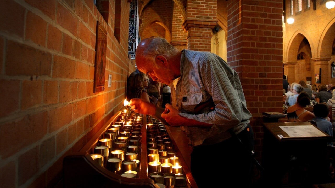 Hometown of alleged NZ massacre gunman holds vigil for victims