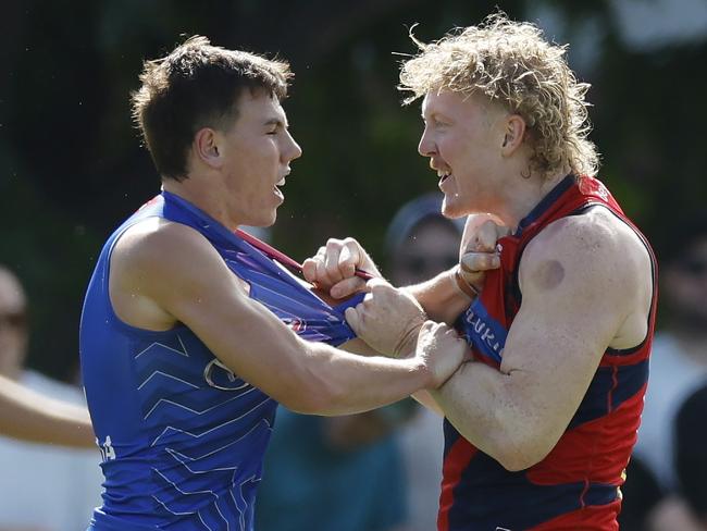 NCA. MELBOURNE, AUSTRALIA. 22nd February, 2025 . North Melbourne vs Melbourne at Arden St Oval.   Clayton Oliver of the Demons welcomes Finn OÃSullivan of the Kangaroos to the big time    .  Picture: Michael Klein