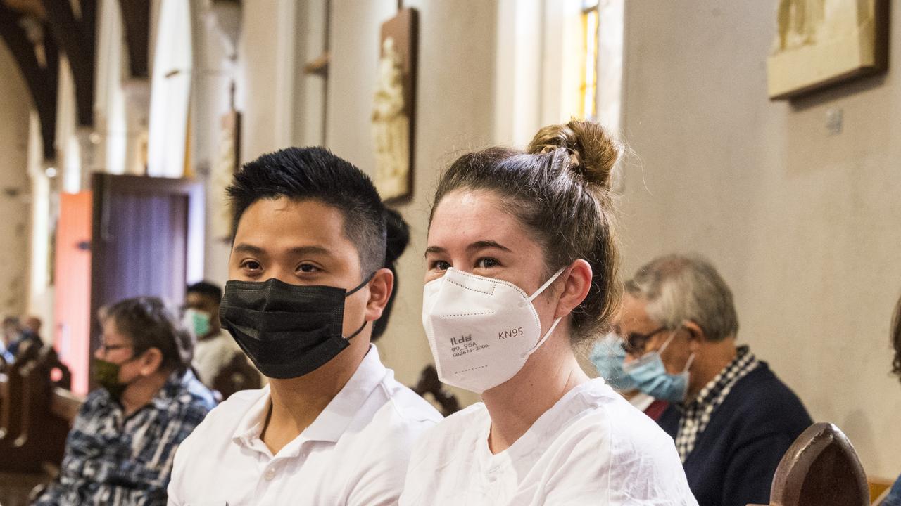 Jessica Skinner and Rex Miguel at the Good Friday service at St Patrick's Cathedral after Easter church services were given the green light following the easing of COVID restrictions, Friday, April 2, 2021. Picture: Kevin Farmer