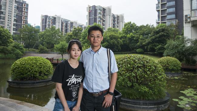 ‘How am I supposed to find so much in cash?’: English teacher Liu Jiabing, 43, and his daughter Kristina, 17, in Nanjing. Picture: Dave Tacon