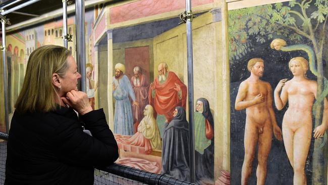 Admiring the frescoes at Cappella Brancacci. Picture: Getty Images