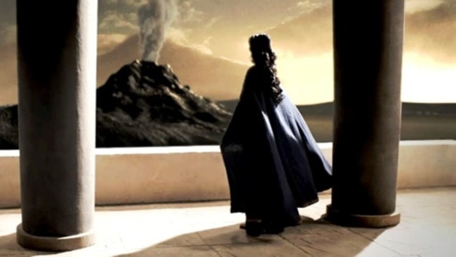 A scene from the BBC telemovie Atlantis: Birth of a Legend showing a Minoan priestess looking over the volcano at the heart of the Santorini islands. New evidence shows just how destructive this eruption was. Source: BBC