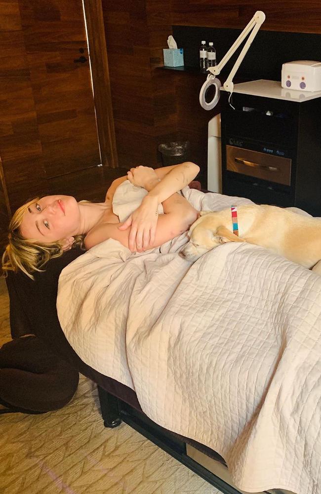 Treating herself to some pampering — with her dog in tow.