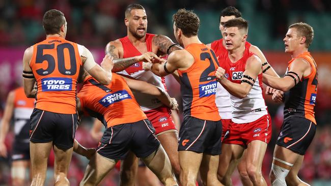 Lance Franklin engages in some push and shove with the Giants. Picture: Getty Images