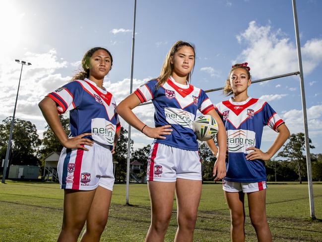 Up-and-coming female Nerang Roosters rugby league players, Xha'Van'Ye Peyroux, 13, Sunny Gerrard, 14, and Tavarna Papalii, 13, are excited about the start of the NRL Women's Premiership. Picture: Jerad Williams