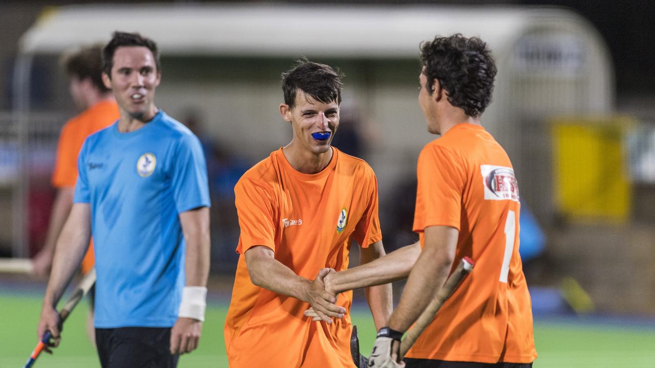 Josh McPaul (centre) celebrates a goal for HSR Hot Shots. Picture: Kevin Farmer