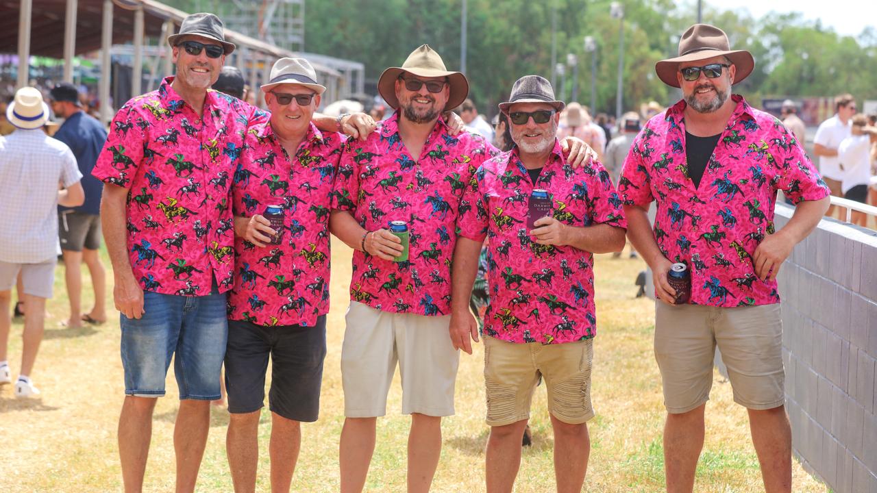 Having a ball at The Great Northern Darwin Cup at Fannie Bay Turf Club are the men in pink “cause they can” from Victoria. Picture: Glenn Campbell