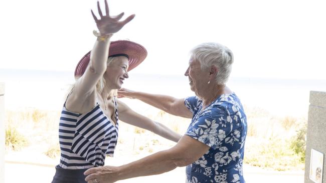 Eve Kheir is reunited with her saviour Sue Williams after she was rescued from drowning at Glenelg beach. Picture: Brett Hartwig