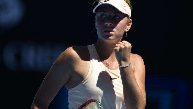 Ukraine's Marta Kostyuk wins a point in the opening set against Olivia Rogowska. Picture: AFP