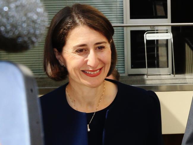 The NSW Liberals hold a party room vote to elect a new Premier after current leader Mike Baird resigned from politics. Premier Mike Baird amd Treasurer Gladys Berejiklian arrive for the meeting. Picture: Toby Zerna