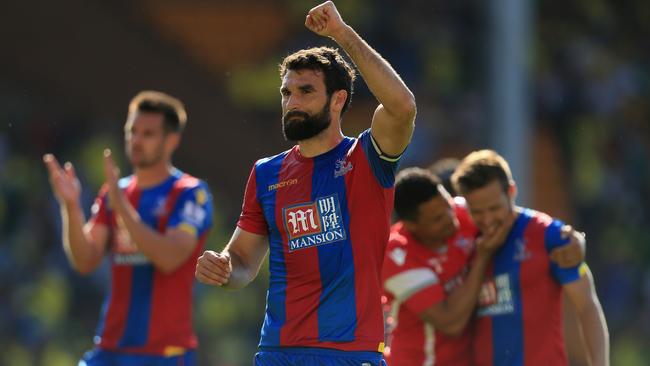 Crystal Palace captain, Mile Jedinak, celebrates his team's 3-1 win over Norwich City at Carrow Road.