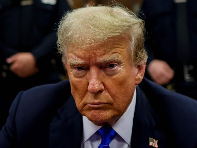 Former US President and Republican presidential candidate Donald Trump attends his criminal trial at Manhattan Criminal Court in New York City, on May 30, 2024. Jurors return Thursday to a second day of deliberations in Donald Trump's criminal trial, leaving the Republican presidential candidate and the country waiting for a decision that could upend November's election. (Photo by JUSTIN LANE / POOL / AFP)