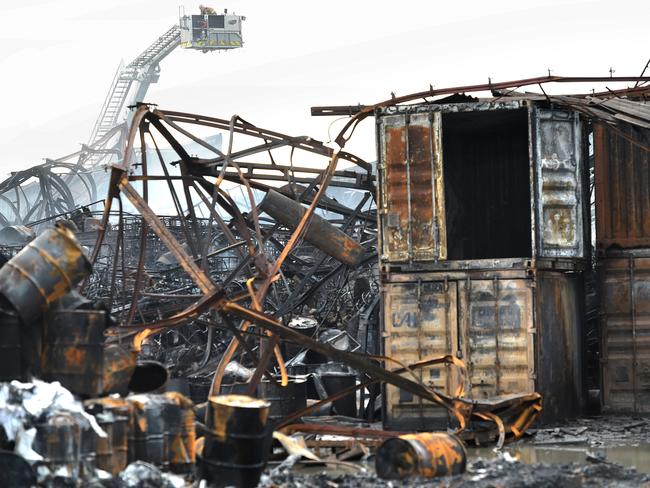 Firefighters working at the West Footscray factory fire. Picture: Nicole Garmston