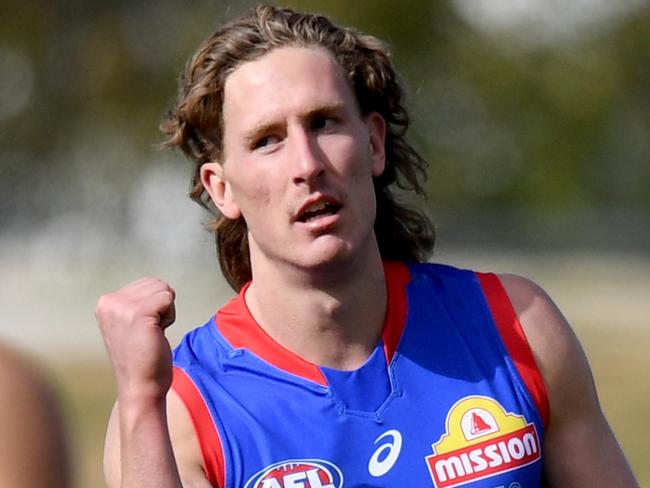 BALLARAT, AUSTRALIA - JULY 31: Aaron Naughton of the Bulldogs celebrates a goal during the round 19 AFL match between Western Bulldogs and Adelaide Crows at Mars Stadium on July 31, 2021 in Ballarat, Australia. (Photo by Morgan Hancock/Getty Images)