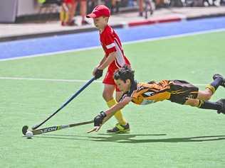 Easts' D and C-Grade talent Tom Savage dives into his work during Saturday's grand final win over Norths/Bellbowrie. Picture: Cordell Richardson