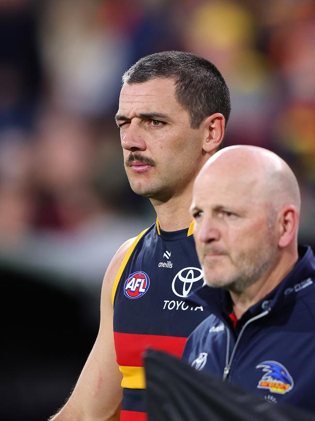 Taylor Walker with his eye injury. Picture: Sarah Reed/AFL Photos via Getty Images)