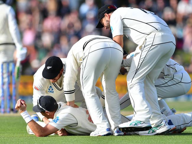 New Zealand's Tim Southee is congratulated by teammates after taking a spectacular catch. Picture: AFP