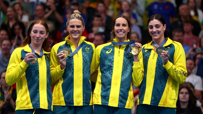 Mollie O'Callaghan, Shayna Jack, Emma McKeon and Meg Harris celebrate with their gold medals. (Photo by Maddie Meyer/Getty Images)