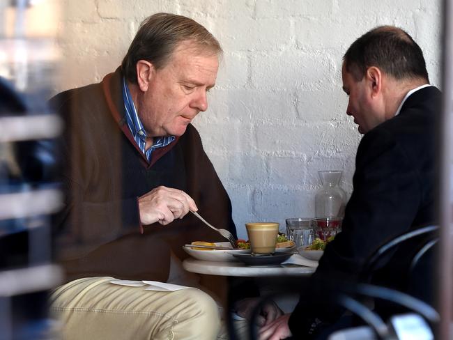 Sage advice … Peter Costello has morning breakfast with the new deputy Prime Minister Josh Frydenberg. Picture: Nicole Garmston