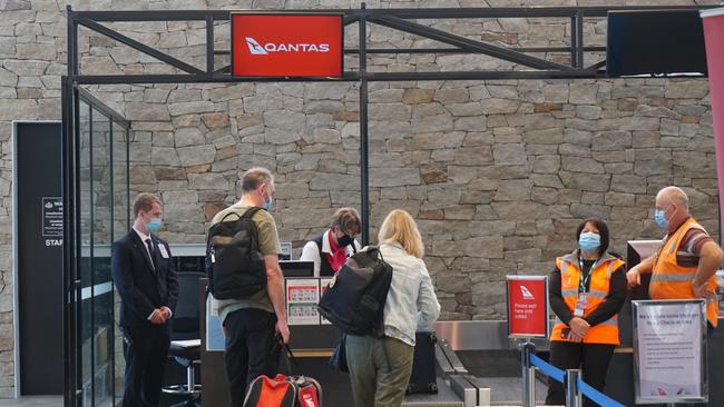 Passengers check in ahead of the first QantasLink flight from Mount Gambier to Adelaide. Picture: Jessica Ball