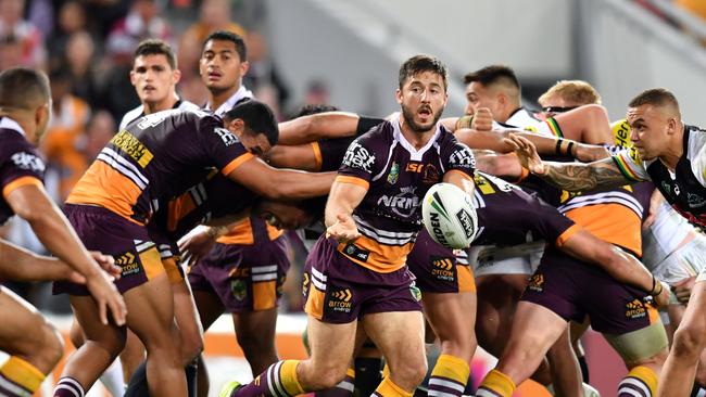 Ben Hunt (centre) of the Broncos in action during the NRL Semi-Final match against the Penrith Panthers at Suncorp Stadium in Brisbane in 2017.