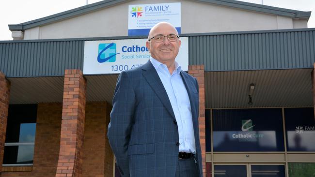 Heritage Bank and People's Choice CEO Peter Lock stands in front of the joint-merger mutual bank's new Toowoomba office on the corner of Ruthven and Union Streets.