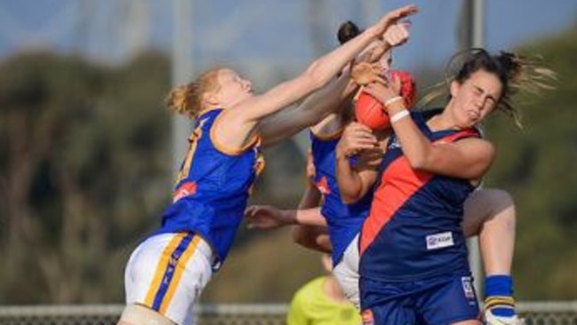 Chloe Molloy take a mark for Diamond Creek in the VFL Women's competition. Picture: Russ Cunham