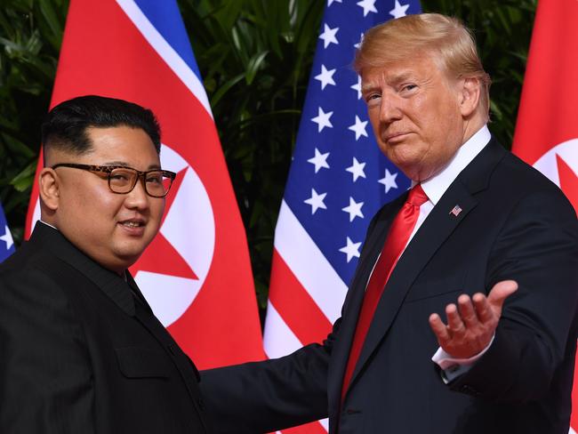 (An unlikely bromance. Donald Trump and Kim Jong-un. Picture: AFP