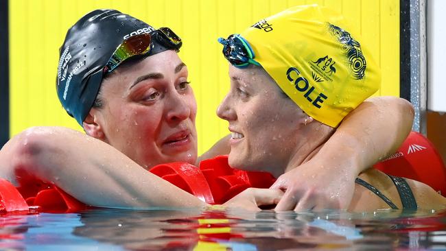 Sophie Pascoe of Team New Zealand celebrates after winning gold in the Women's 100m Freestyle S9 Final with Ellie Cole of Team Australia on day one of the Birmingham 2022 Commonwealth Games. Picture: Getty