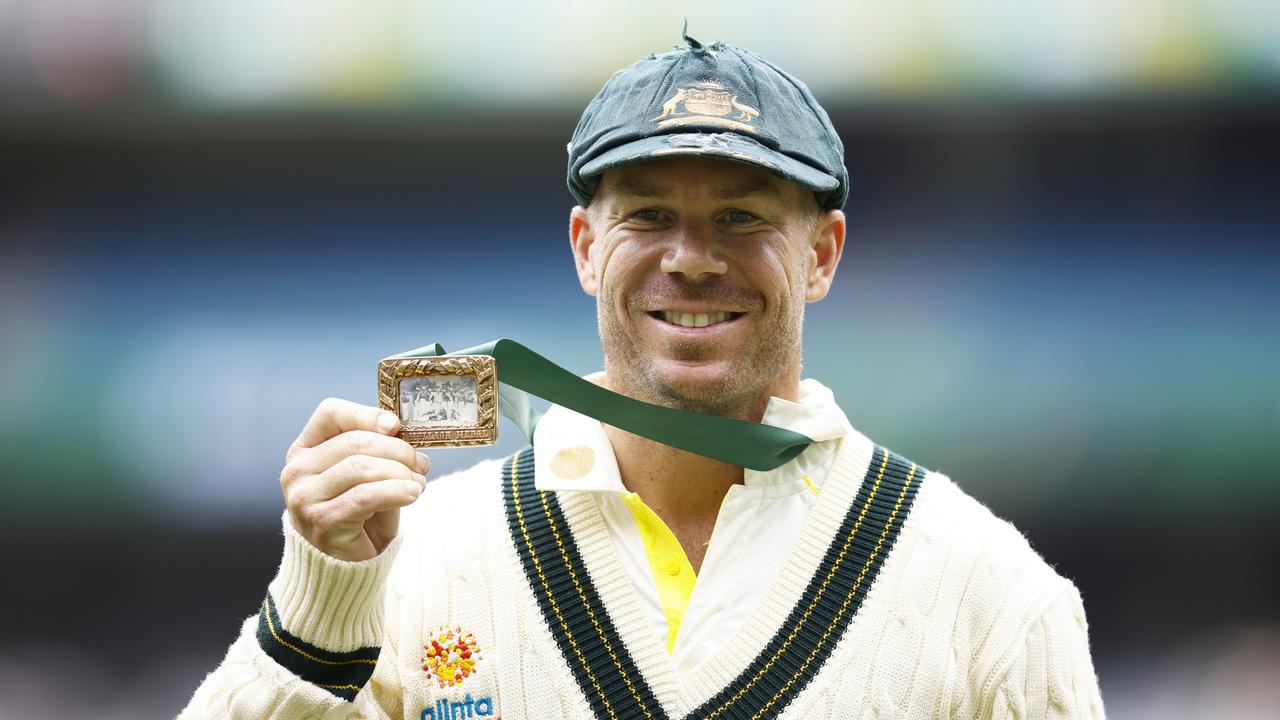 David Warner holds the Mullagh Medal after being awarded player of the series. Picture: Getty