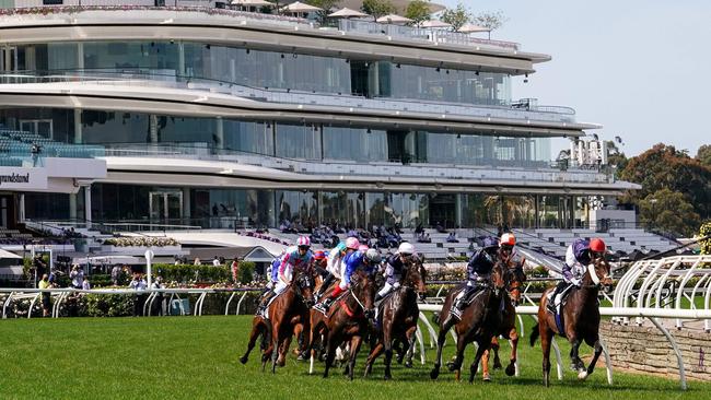 Melbourne Cup winner Twilight Payment leaves the home straight in front of empty grandstands.