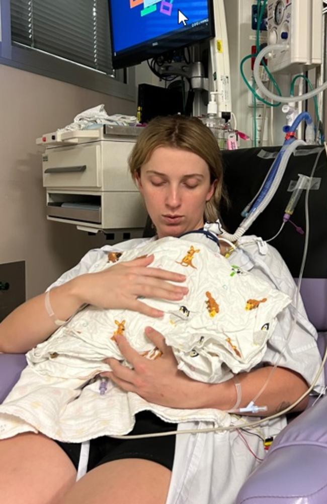 Surprised mum Emelia Phillips, 22, with her little bundle of premature joy Imelda at the Mater Mothers. Pictures: Mater Mothers