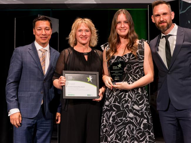 The AFP Dandelion team and Paul Hoon, CEO etrainu, who presented the award. Picture: Supplied